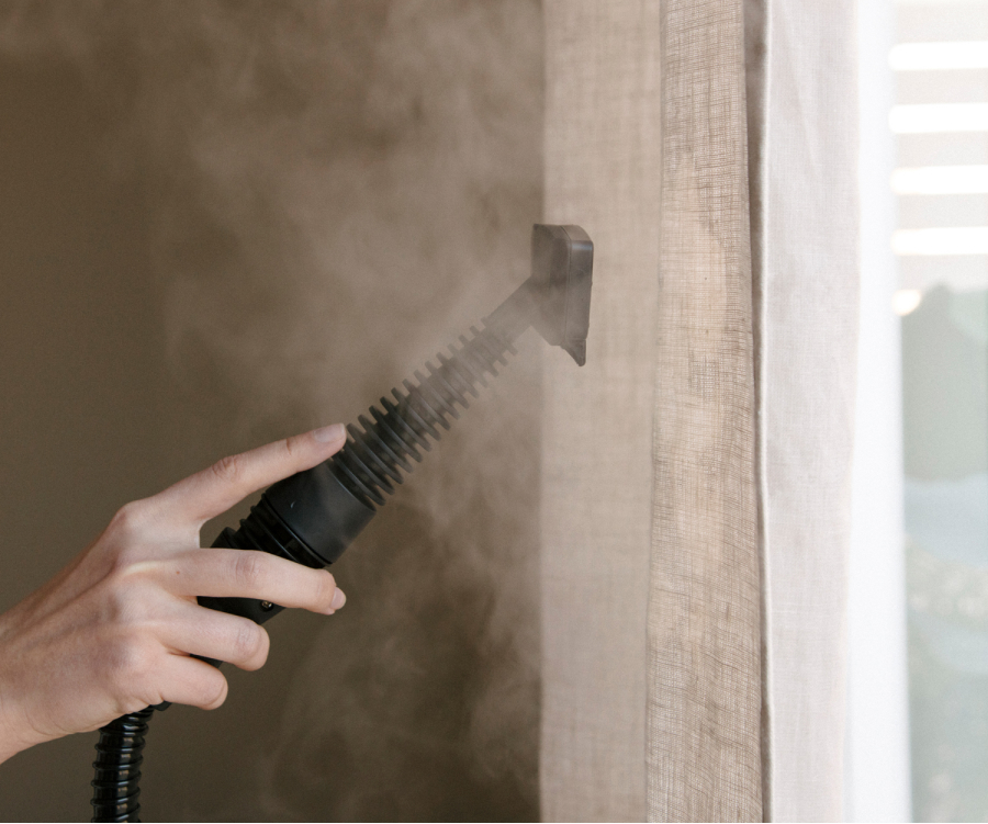 Irons, cleans and disinfects fabrics